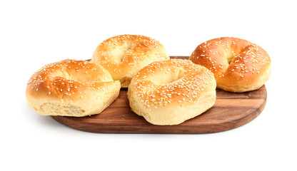 Obraz na płótnie Canvas Wooden board of tasty bagels with sesame seeds on white background