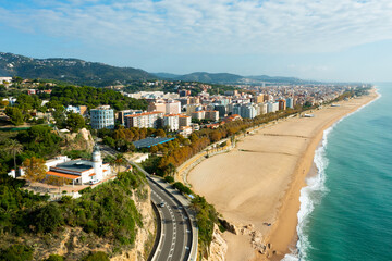 Birds eye view of Calella, Spain. Residential building along Mediterranean sea coast and beach...