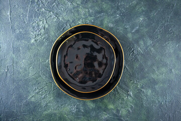 top view black round plate on a dark background meal vegetable darkness kitchen meat cuisine food shine