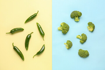Composition with pepper and broccoli on color background