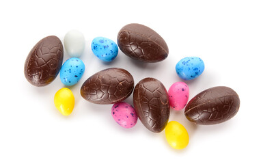 Obraz na płótnie Canvas Chocolate Easter eggs and sweet candies isolated on white background