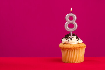 Birthday cake with candle number 8 - Rhodamine Red foamy background