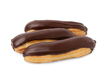 Delicious eclairs covered with chocolate isolated on white