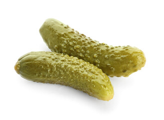 Tasty fermented cucumbers on white background
