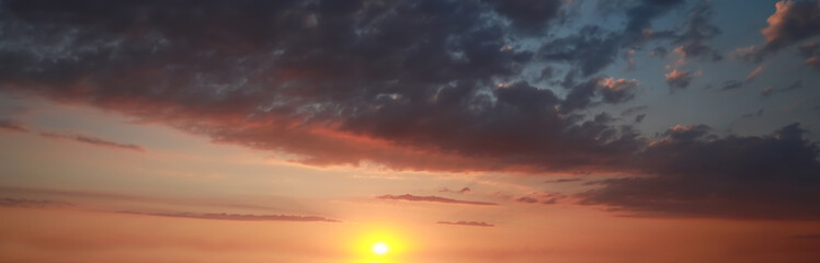 Fototapeta na wymiar Sun shining on beautiful cloudy sky at sunset, banner design