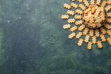 top view little crackers inside plate on dark background crisp color snack cips salt bread dry rusk pepper
