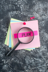 top view plan written note on sticker on gray background paper college lesson notepad note student pen study
