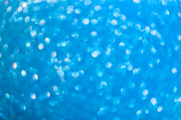 Abstract blurred background. Defocused portrait lens back. Backdrop bokeh. Vivid blue.