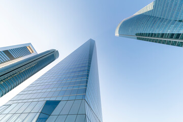 Fototapeta na wymiar Cuatro Torres Business Area in Madrid with blue sky, spain