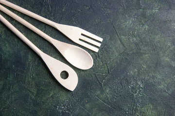 top view plastic utencils on dark background photo fork food knife plastic cutlery dinner spoon