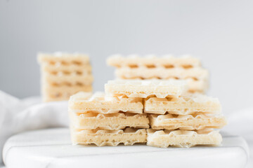Vanilla wafers on a marble plate, wafer cookies filled with vanilla cream