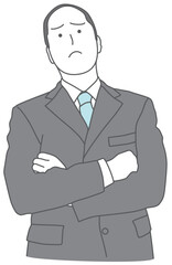 腕組みをして考えるスーツを着た男性