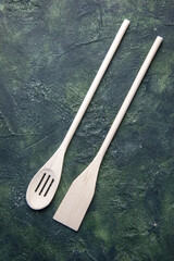 top view white plastic utencils on a dark background plastic fork cutlery wood darkness knife kitchen food photo