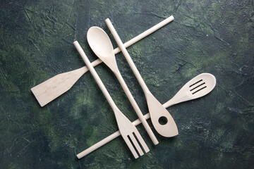 top view white plastic utencils on the dark background kitchen cutlery food spoon fork photo knife...