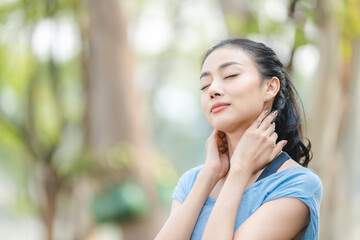 Fitness woman stretching before or after workout, Asian fit girl workout exercise in the morning at nature park outdoor, sport fitness lifestyle for athlete body to wellness healthy