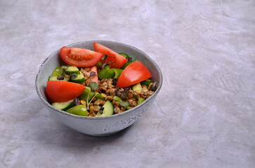Salad slices of raw vegetables with lentils
