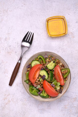 Salad slices of raw vegetables with lentils