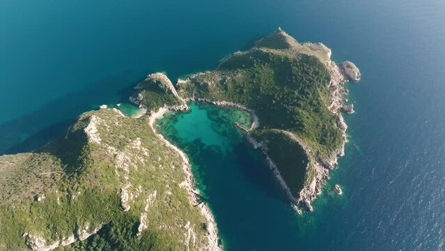 Aerial shows the beautiful Arc of Porto Timone, Corfu.