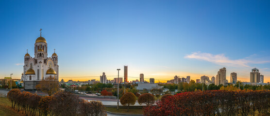 Temple in autumn in beautiful orange sunset light. Temple on Blood, Yekaterinburg, Russia