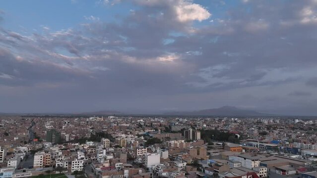 Aerial view 4k video by drone of Chiclayo City, Peru on sunset.