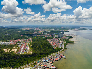 Aerial drone of city of Sandakan on the seashore on the island of Borneo, Malaysia.