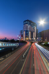 Fototapeta na wymiar Modern office building and traffic in downtown district of Hong Kong city