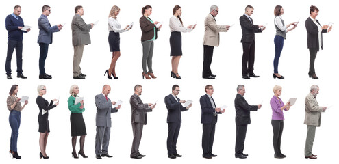 group of people holding tablet and looking ahead