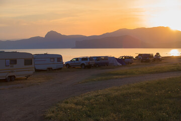Cars and camping trailers at Camping by the sea