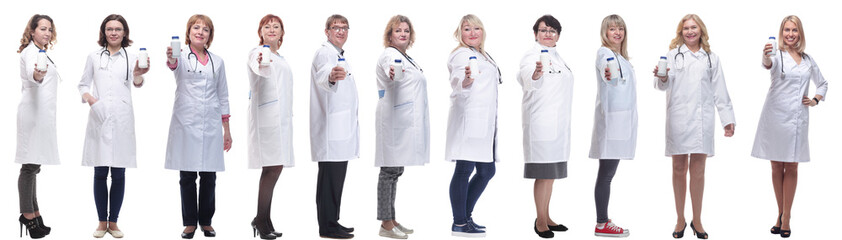 Fototapeta premium group of doctors holding jar isolated on white