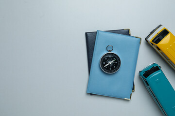 Traveling, adventure and vacation concept with compass