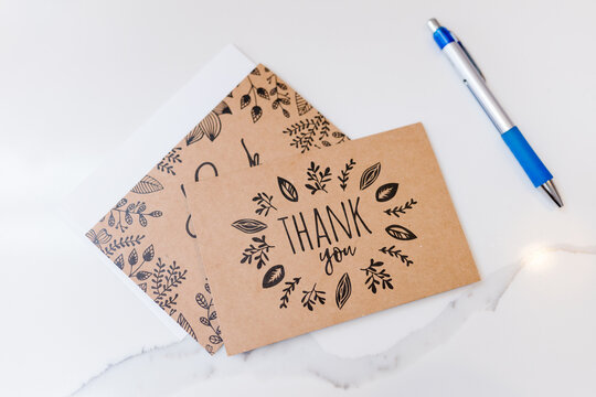 Brown and black boho thank you cards and pen