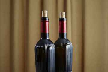 Two wine bottles with corks