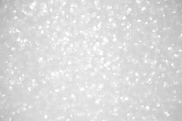 Abstract of shining bokeh glitters for background with copy space. Christmas and New Year wallpaper decorations concept