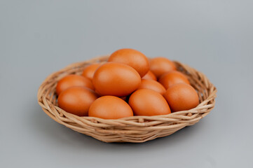 Chicken eggs in a panel. Clean chicken eggs on a gray background.