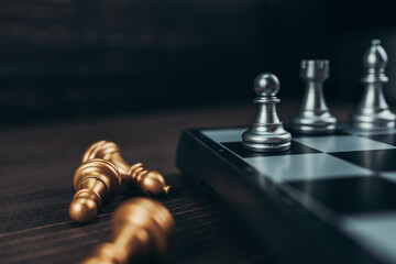 chess piece on chess board game for ideas, challenge, leadership, strategy, business, success or abstract concept. © Charnchai saeheng