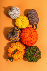 Traditional autumn background. Assorted of knitted pumpkin, handmade concept