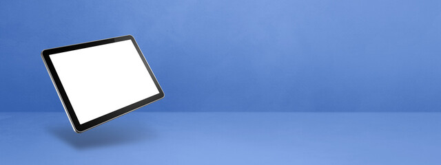 Floating tablet pc computer isolated on blue. Horizontal banner background