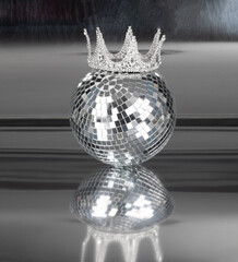 silver disco ball and crown