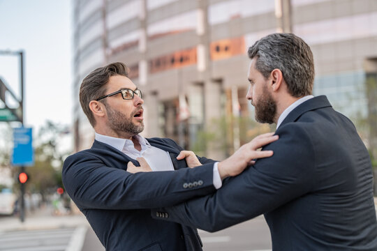 image of businessmen have business conflict. businessmen have business conflict.