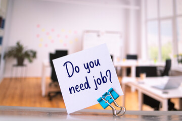 Do you need job? written on a memo at the office