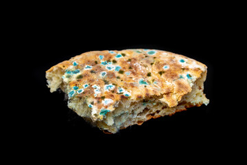 Mold on bread close-up macro. Mold on food. Fluffy mold spores as a background or texture. Mold fungus. Abstract background with copy space.