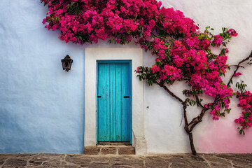 Obraz na płótnie Canvas Old blue door with blooming pink bougainvillea in a European town, generative AI.