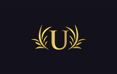 Obraz premium Golden laurel wreath leaf logo design vector with the letters and alphabets and bamboo leaf