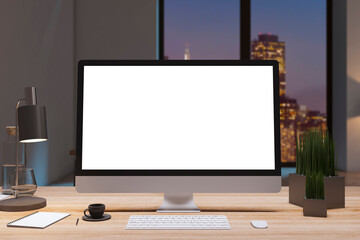 Close up of designer office workplace with empty white computer monitor, window with night city view, decorative items and supplies. Mock up, 3D Rendering.