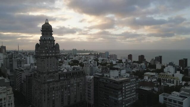 sunset aerial skyline cityscape view of Montevideo city of Uruguay , with Palacio Salvo at the intersection of 18 de Julio Avenue and Plaza Independencia