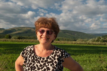 Portrait of a mature woman smiling outdoor