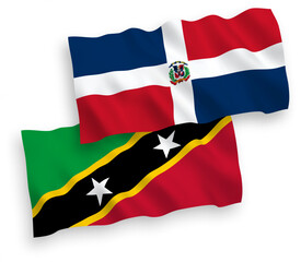 Flags of Federation of Saint Christopher and Nevis and Dominican Republic on a white background