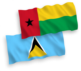 Flags of Saint Lucia and Republic of Guinea Bissau on a white background