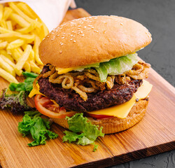 burger with onion chips and fries