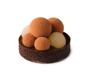 chocolate mini tart decorated with chocolate balls